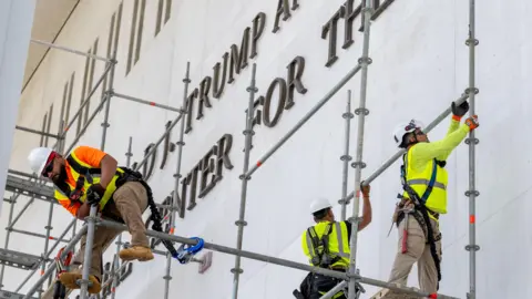 Trump’s name removed from Kennedy Center after judge order
