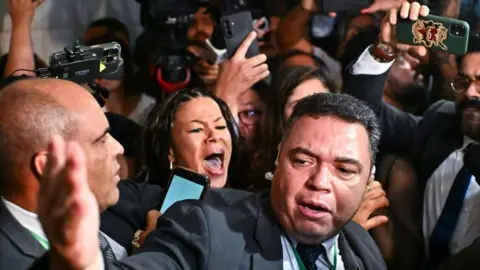 Chaos Erupts in Brazilian Congress Over Bolsonaro's Sentence Reduction