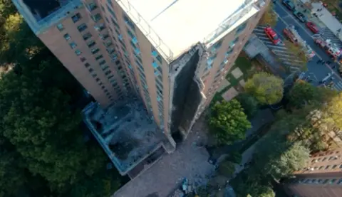 New York City Apartment Building Partially Collapses Following Explosion