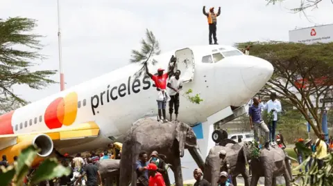 Massive Turnout at Kenyan Airport for Raila Odinga's Arrival; Flights Suspended