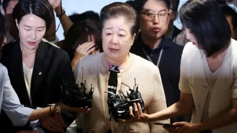 Unification Church Leader Denies Bribery Allegations Involving Former First Lady