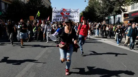 Nationwide Strikes Erupt in France Against Budget Cuts