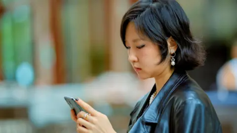 The Rise of 'Are You Dead?': A Viral App Addressing Loneliness in China