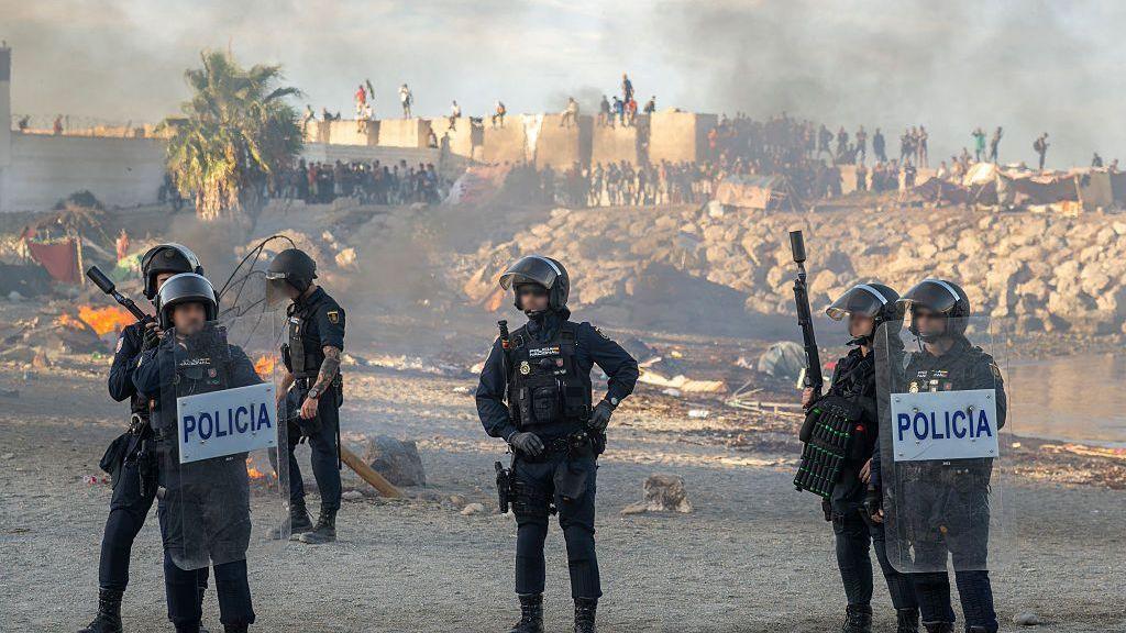 Violence erupts in Ceuta as migrant influx sparks tensions