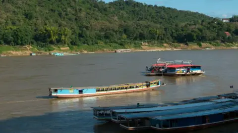 Tragedy Strikes as Tourists Rescued from Capsized Ferry in Laos