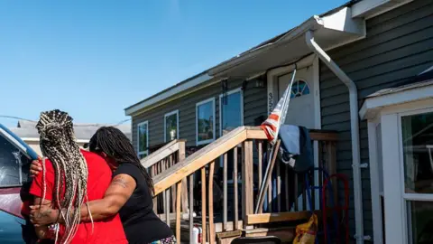 Tragic Escape: Woman and Child Leap from Roof Amid Louisiana Mass Shooting