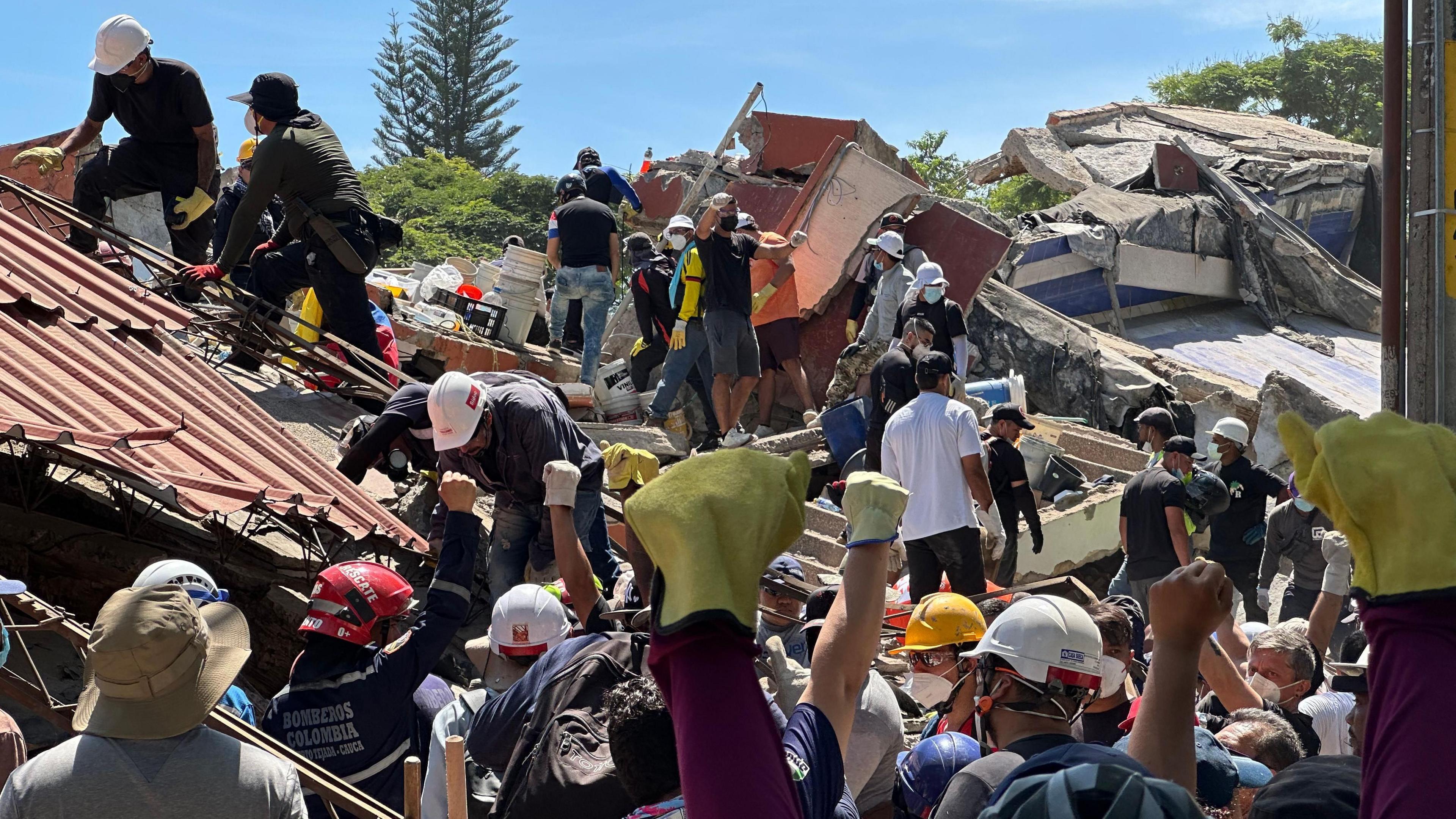 Silent Hope: Colombian Families Search Rubble for Missing Loved Ones