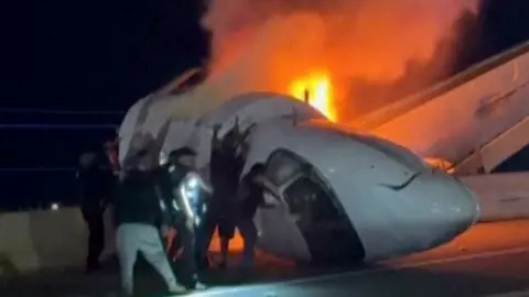Bystanders Rush to Rescue Jet Passengers After Fiery Texas Crash