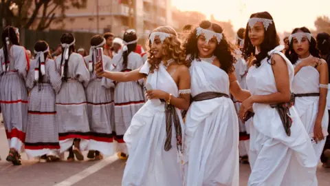 Ethiopians Embrace Tradition with Selfies and Singing at Irreecha Festival