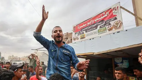 Palestinians Celebrate Ceasefire Amidst Grief and Loss