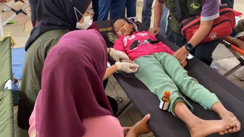 Health Crisis: Over 1,000 Indonesian Children Ill from Controversial Free Lunch Program