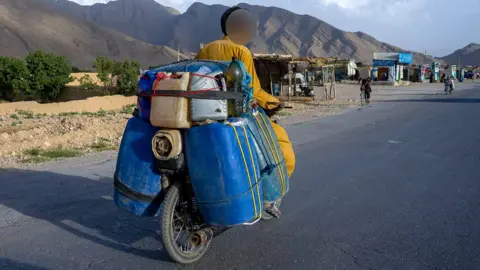 Biking Through Risk: How Smugglers Ferry Iranian Fuel Across a Scorching Border
