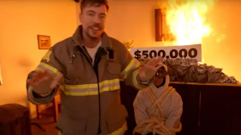 MrBeast Faces Backlash for Daring Cash Stunt in Burning Building