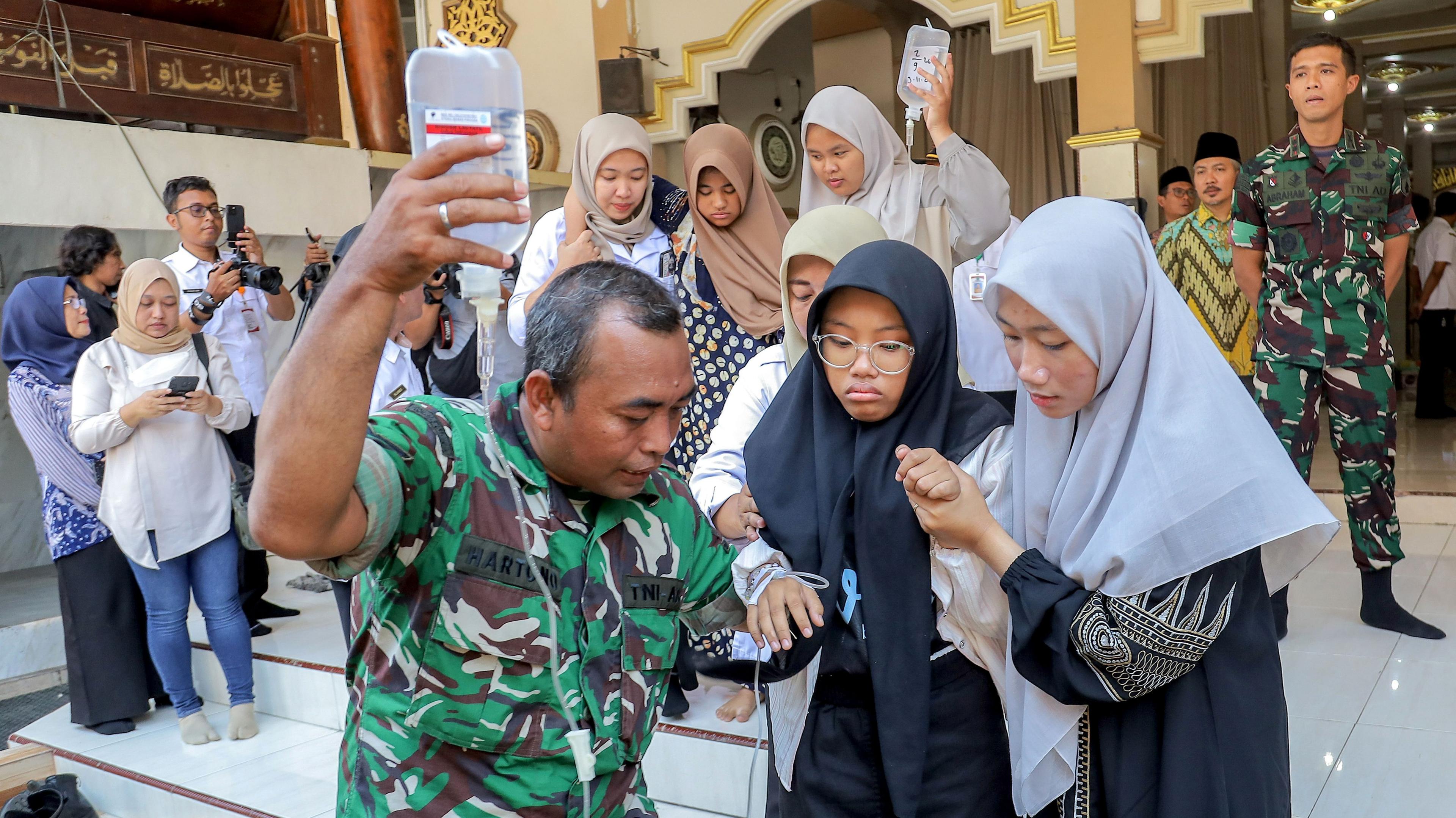 Nearly 2,000 Indonesians Fall Ill After Free School Meals