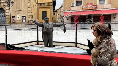 Pavarotti's Statue Surrounded by Ice Sparks Controversy in Italy