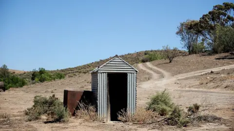 Woman Rescued After Getting Trapped in Collapsed Toilet in Australian Outback