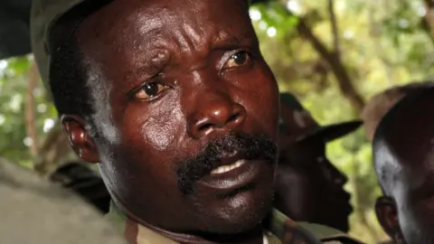 Ugandan Survivors Demand Justice as Kony Faces War Crimes Charges